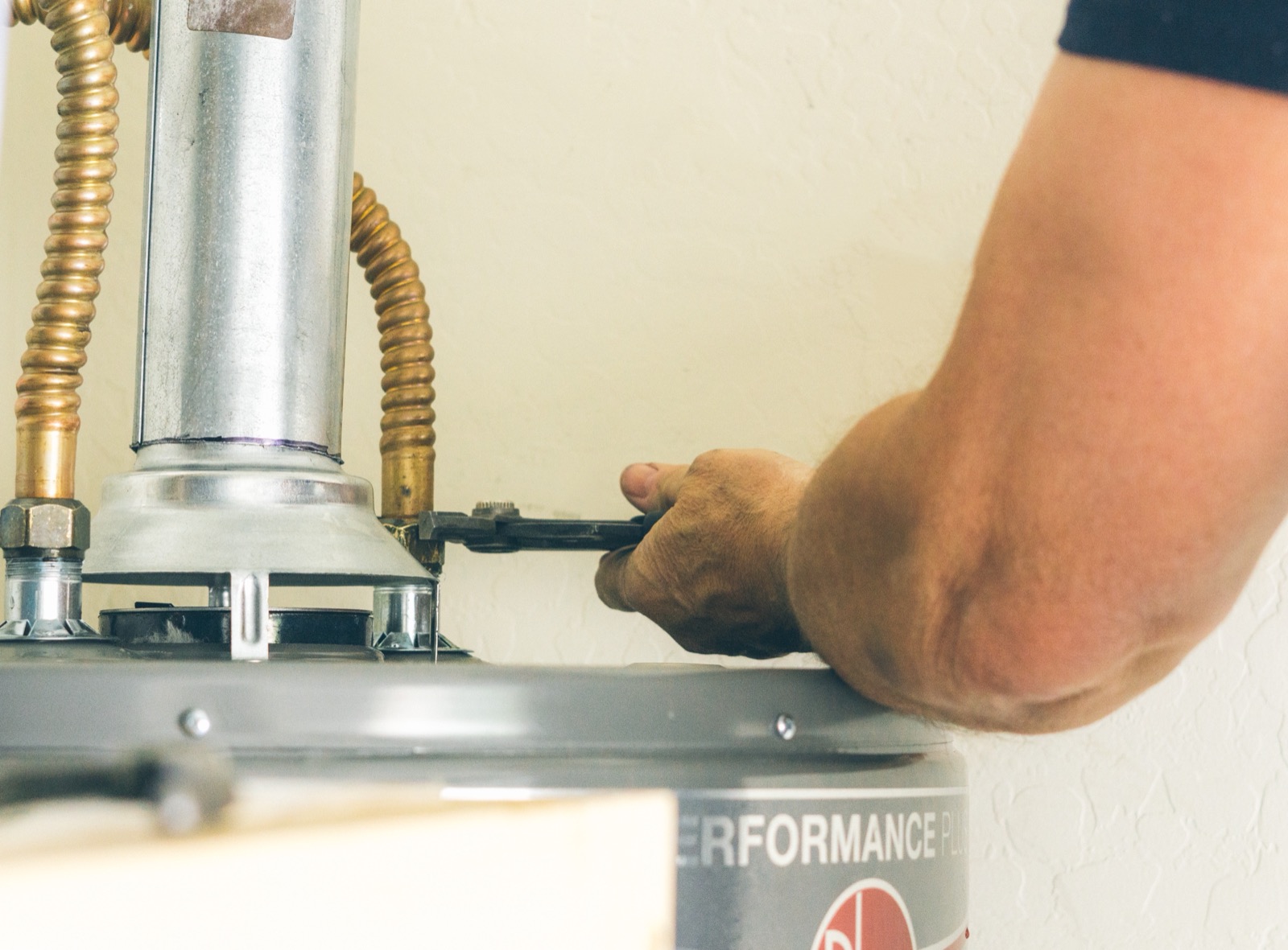 Close-up of a silver plumbing pipe repair after a freeze