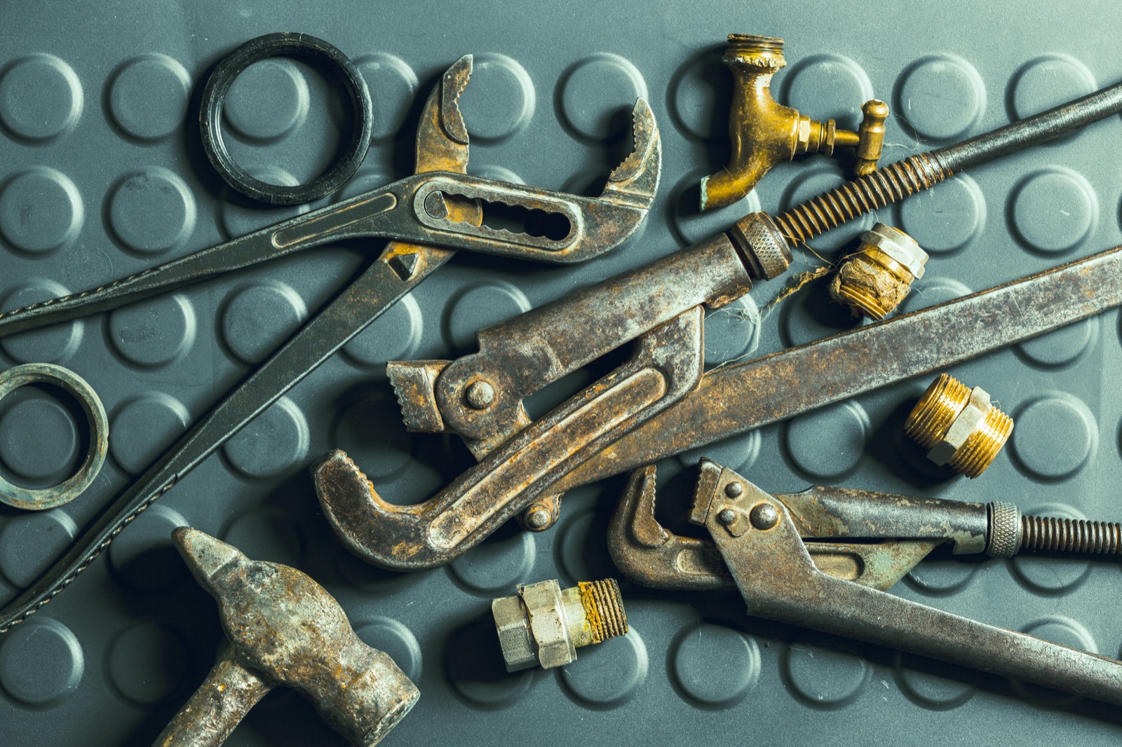 Well-worn plumbing tools reflecting the older pipe common near Weatherford's historic square